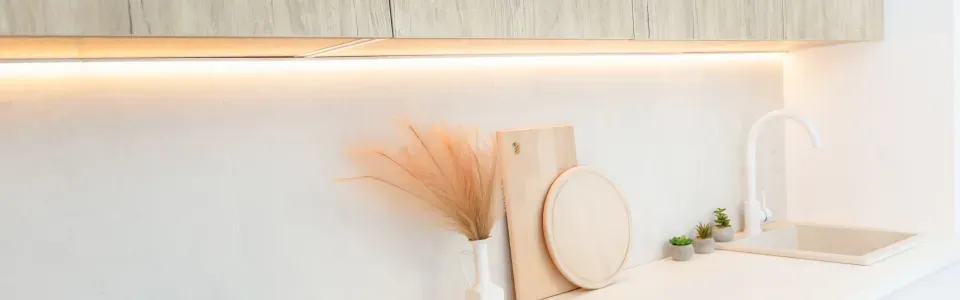 photo of lighting under cabinets that illuminates counterspace in a kitchen